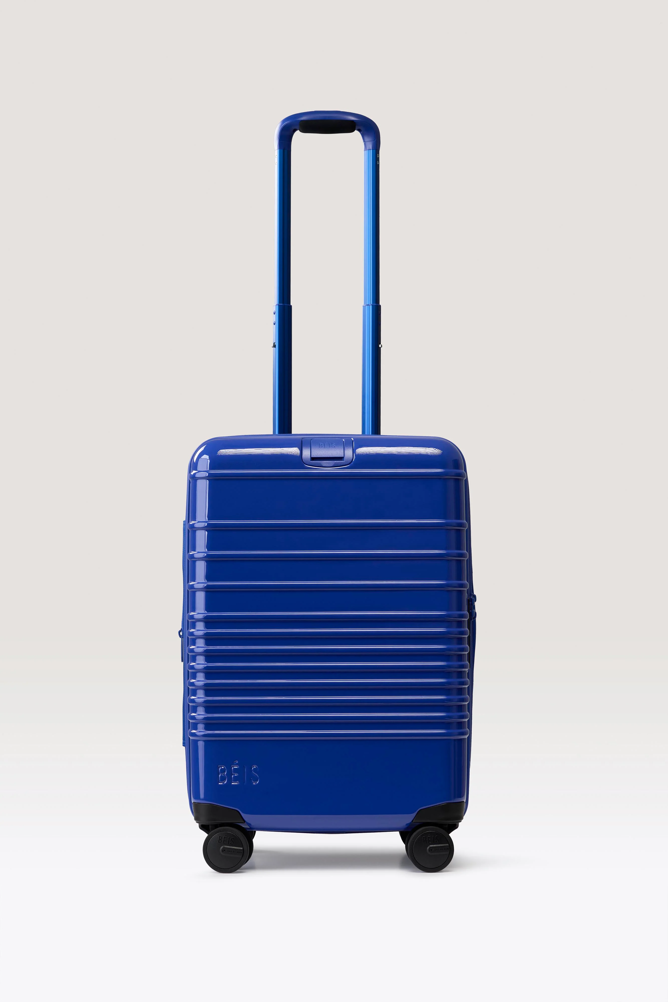 The Carry-On Roller in Glossy Cobalt Blue